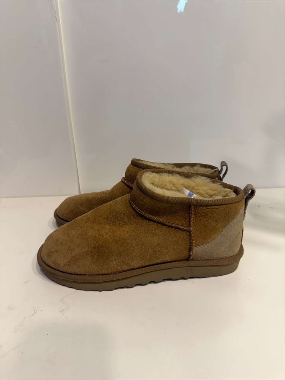 Used women’s size 8 Ugg low boots in tan
